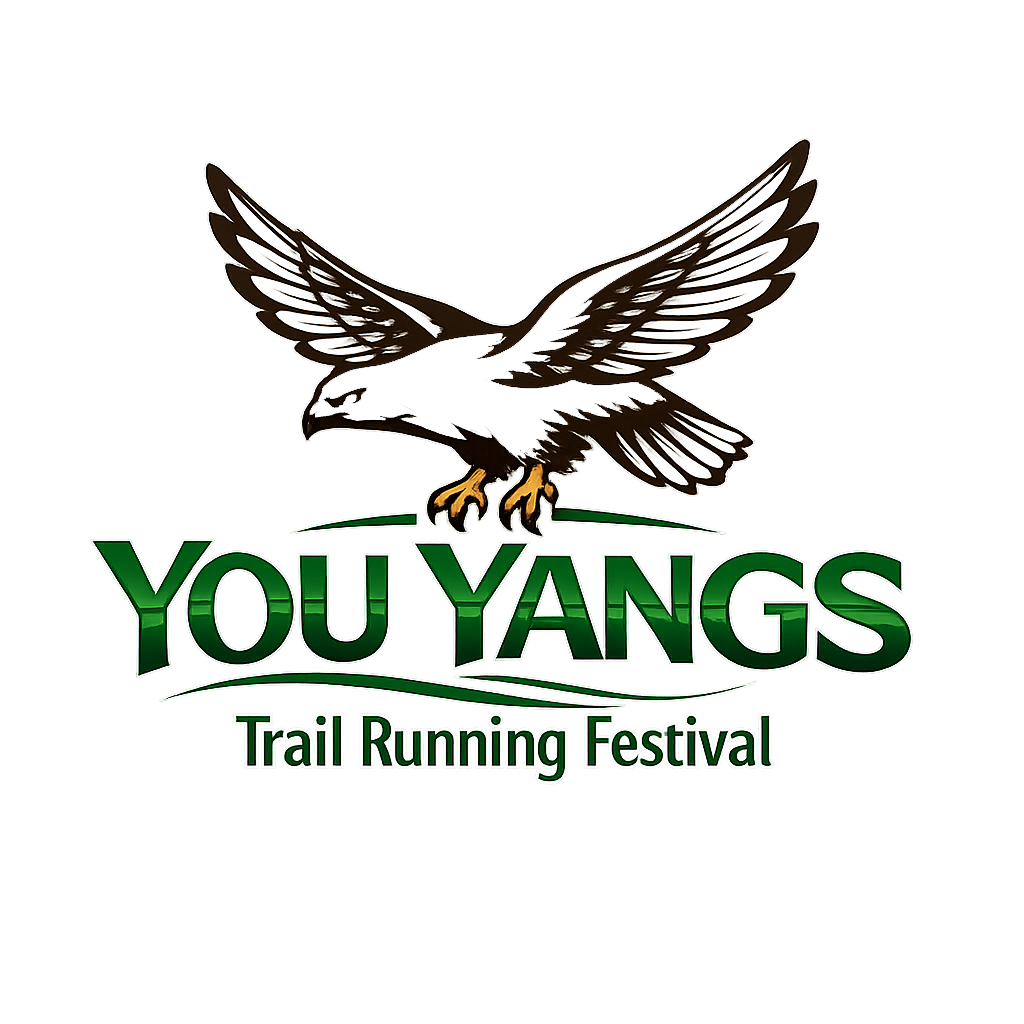 Trail runners climbing granite peaks at You Yangs Regional Park Victoria